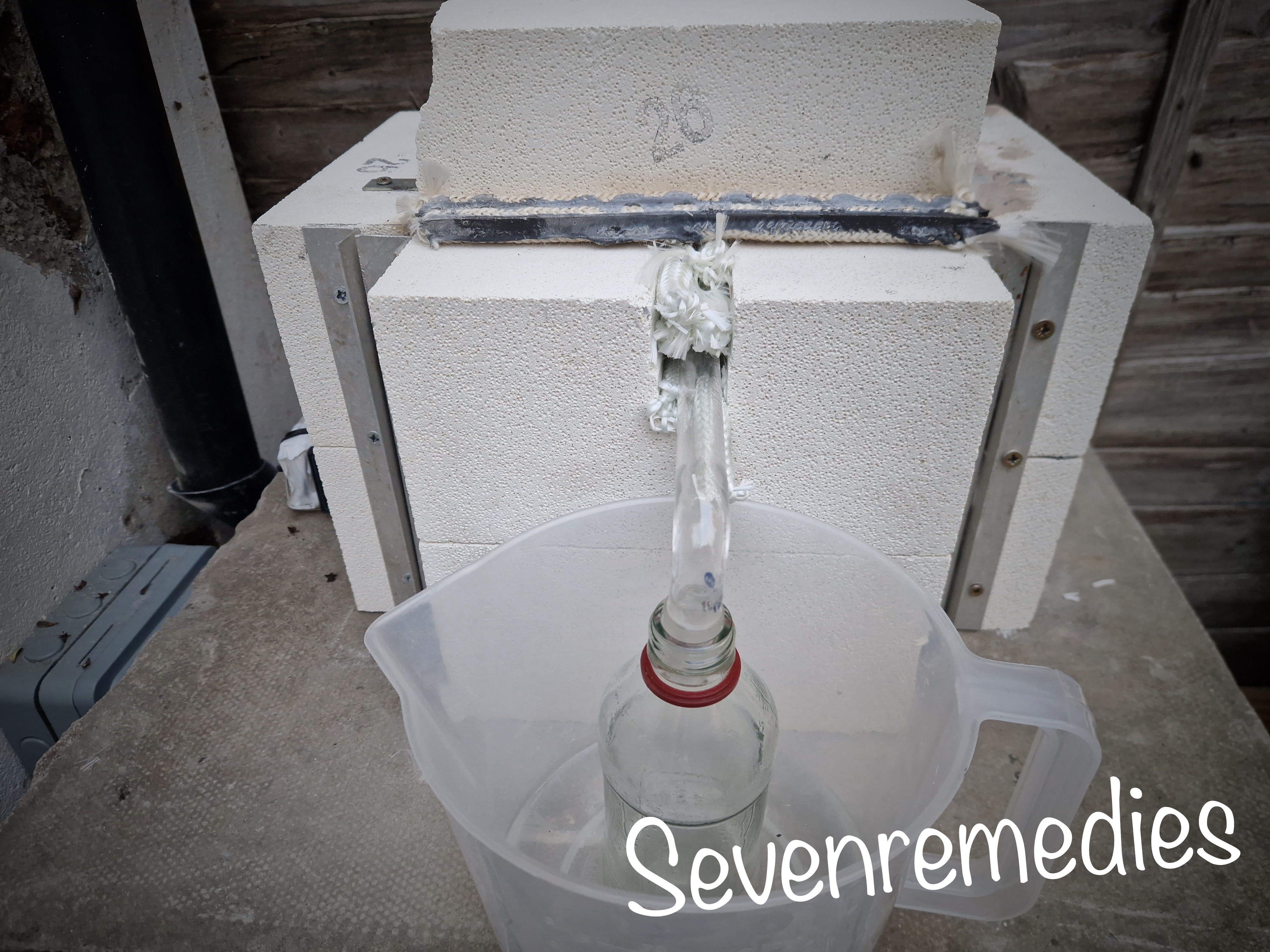 High heat pyro distillation begins in the homemade kiln.